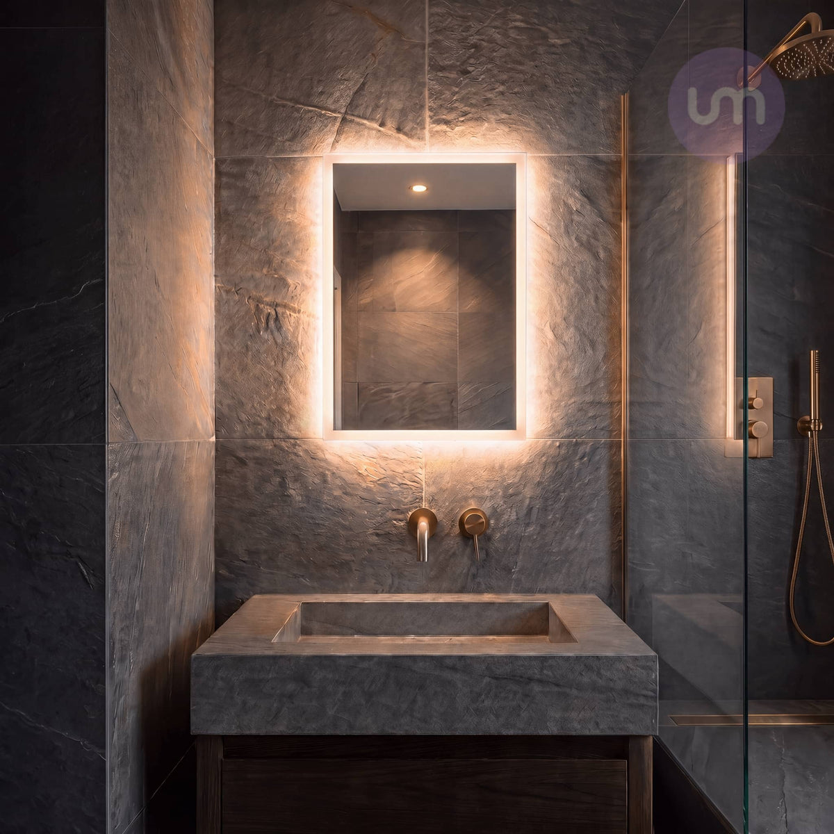 Cara Edge 400 x 600 mm edge-lit LED mirror – warm white 2700K glow in a charcoal slate bathroom with stone trough basin